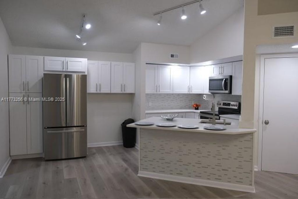 Photo of 1401 Village Blvd #137, West Palm Beach, FL 33409 (MLS # A11773256)