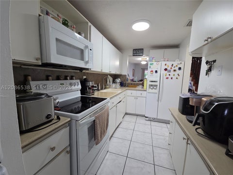 Photo of 1784 W 56th Ter #401, Hialeah, FL 33012 (MLS # A12086538)