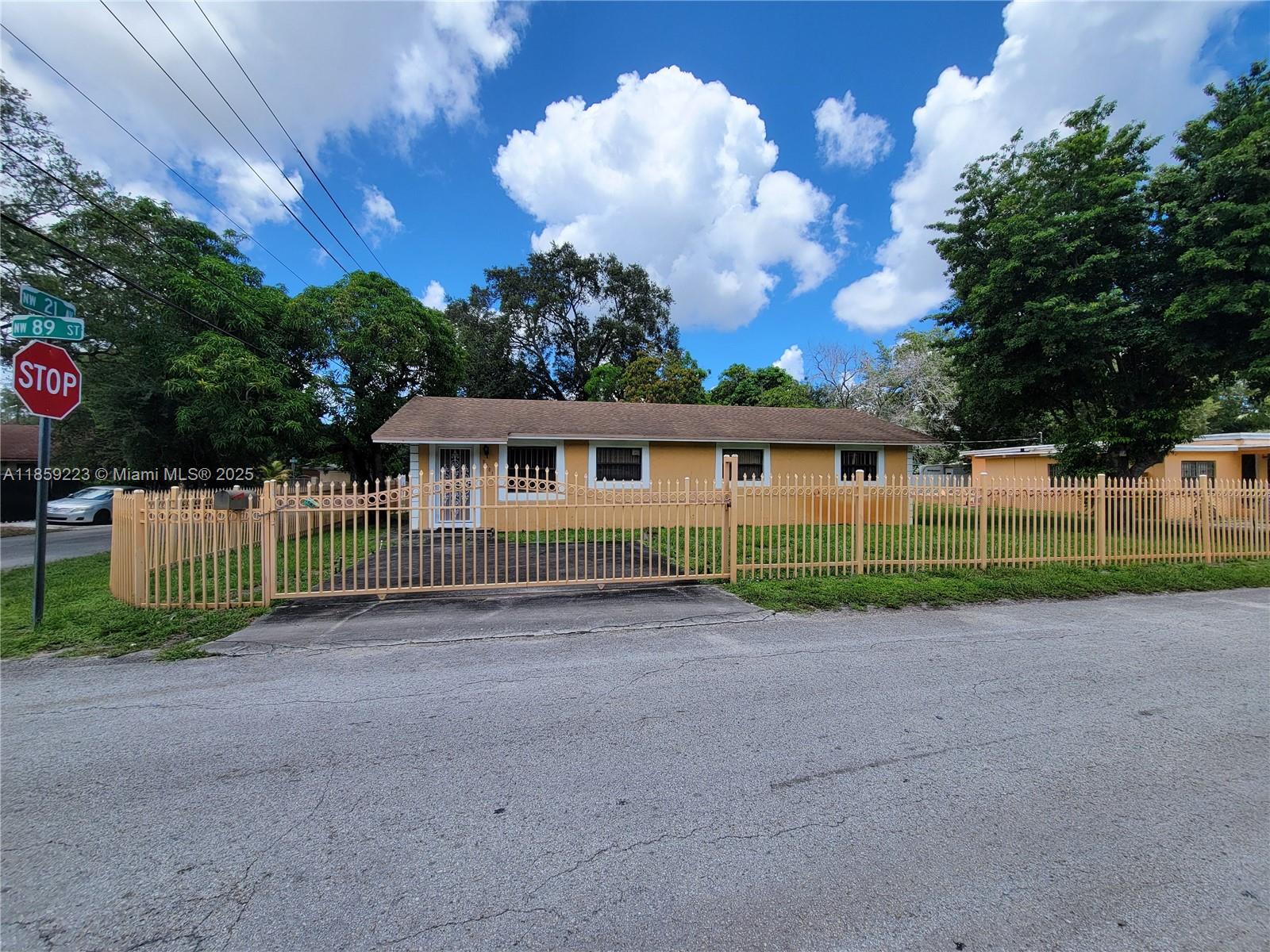3-bedroom, 2-bath home on a corner lot featuring a additional bedroom and an additional flex space that can be converted into an efficiency—ideal for extended family or rental income. Zoned for duplex use, this property offers long-term flexibility for homeowners or investors. The property is fully fenced by a wrought iron enclosure, the home boasts two expansive concrete parking areas and a solid concrete utility shed for storage or workspace needs. The roof is just 6 years old, offering peace of mind, while the interior presents a great opportunity for customization and TLC. Whether you're housing a large family or exploring multi-unit income potential, this property delivers value, space, and versatility in one package.
