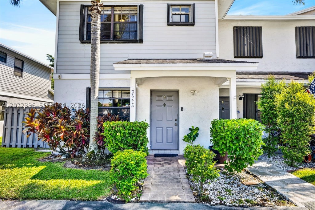 Photo of 10348 NW 3rd St, Pembroke Pines, FL 33026 (MLS # A12072396)