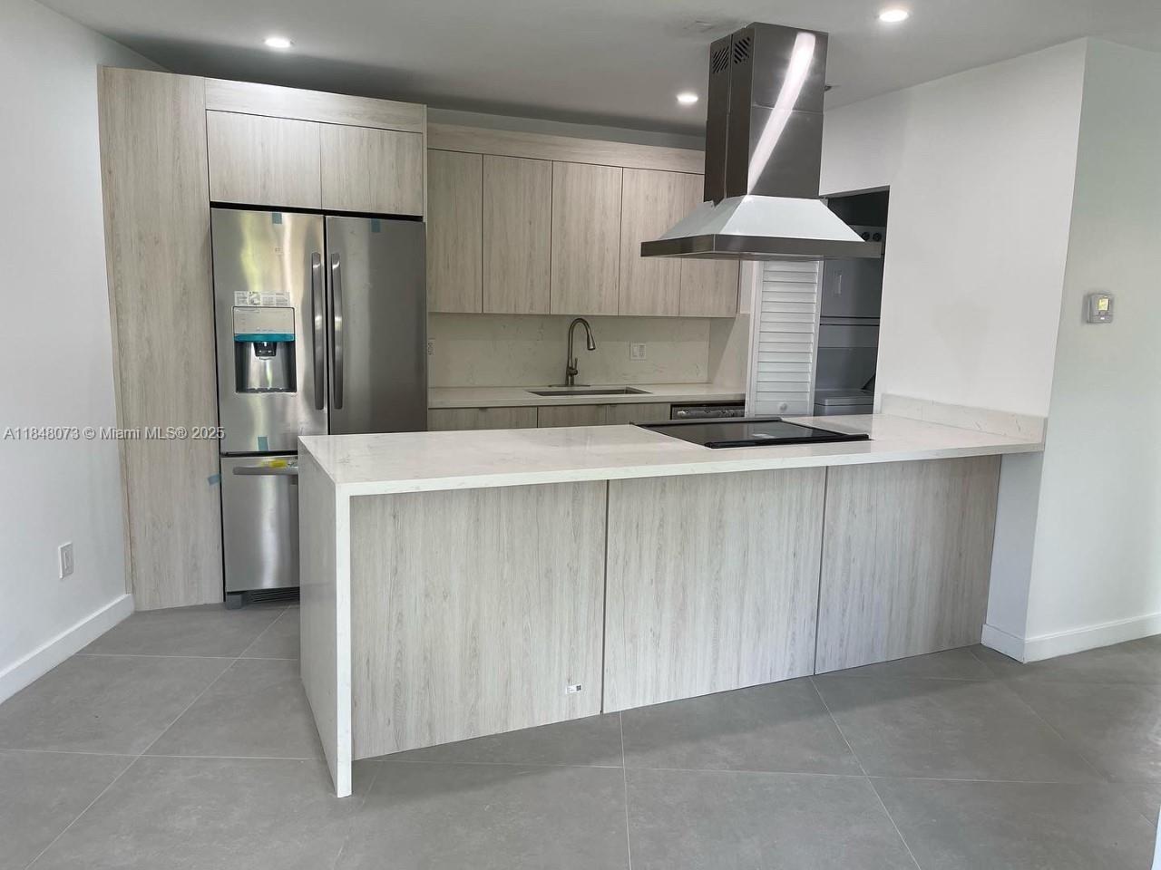 Completely remodeled 3/2 unit with impact windows, beautiful uniform tile flooring, renovated kitchen with updated appliances and newer lighting. Unit has renovated baths and washer/dryer in unit. Ample parking. A real gem. Great location in Biscayne Park with easy access to US1, beaches and highway. Pet friendly with deposit. Easy to show. Quick approval and move in process. Available Sept 1st, 2025.