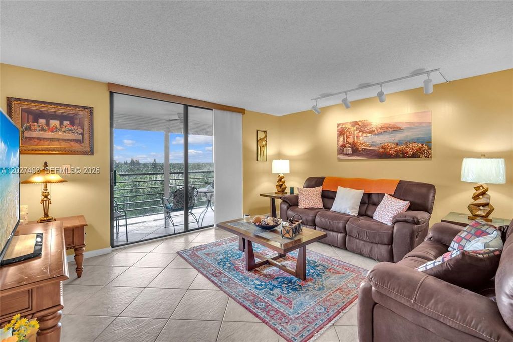 Photo of 900 Saint Charles Place #PH9, Pembroke Pines, FL 33026 (MLS # A12027403)