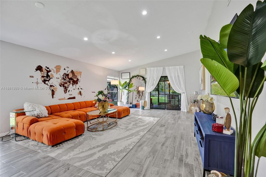 Photo of 6188 pine tree Lane, Tamarac, FL 33319 (MLS # A11881999)