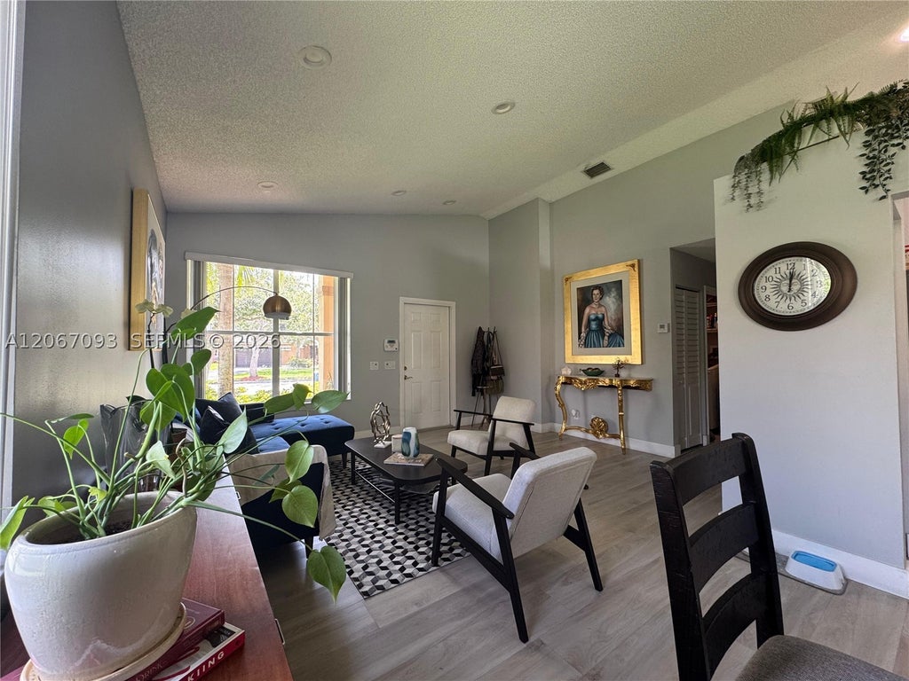 Photo of 825 Falling Water Rd, Weston, FL 33326 (MLS # A12067093)