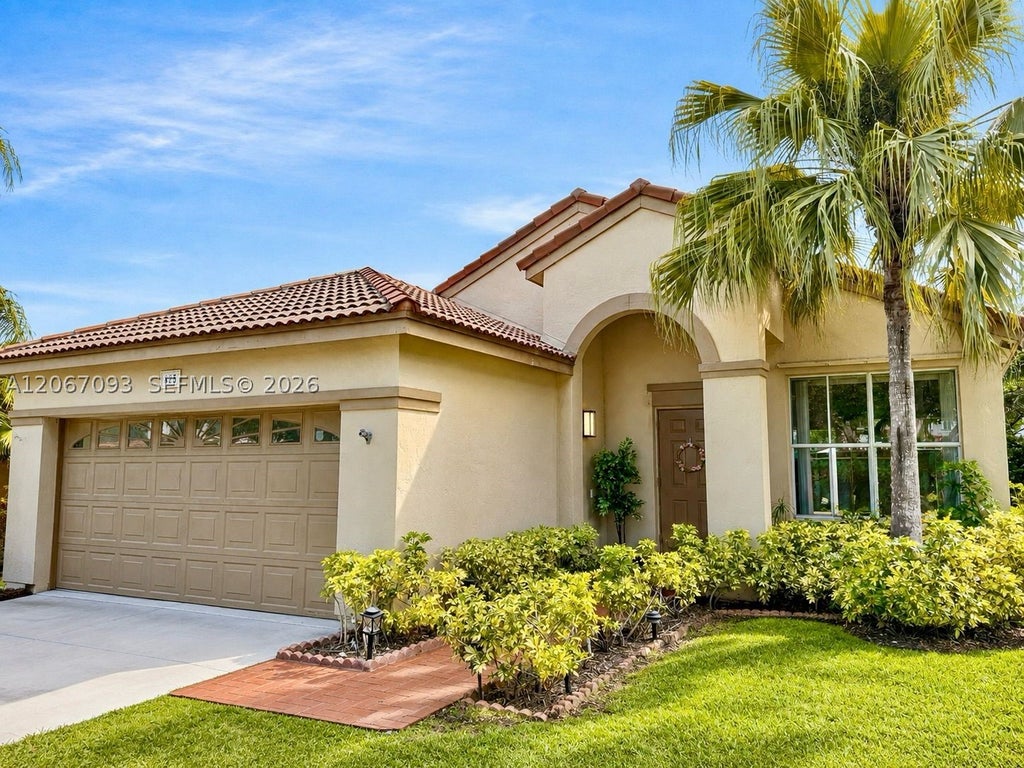 Photo of 825 Falling Water Rd, Weston, FL 33326 (MLS # A12067093)
