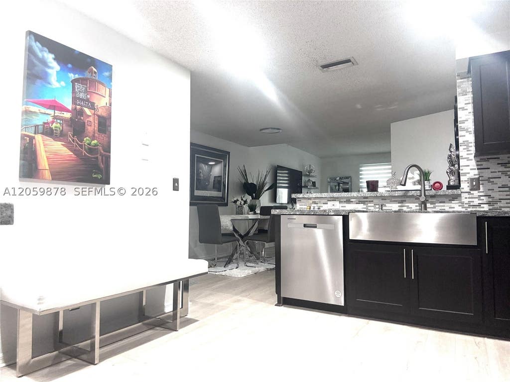 Photo of 1543 Barcelona Way #5-30, Weston, FL 33327 (MLS # A12059878)