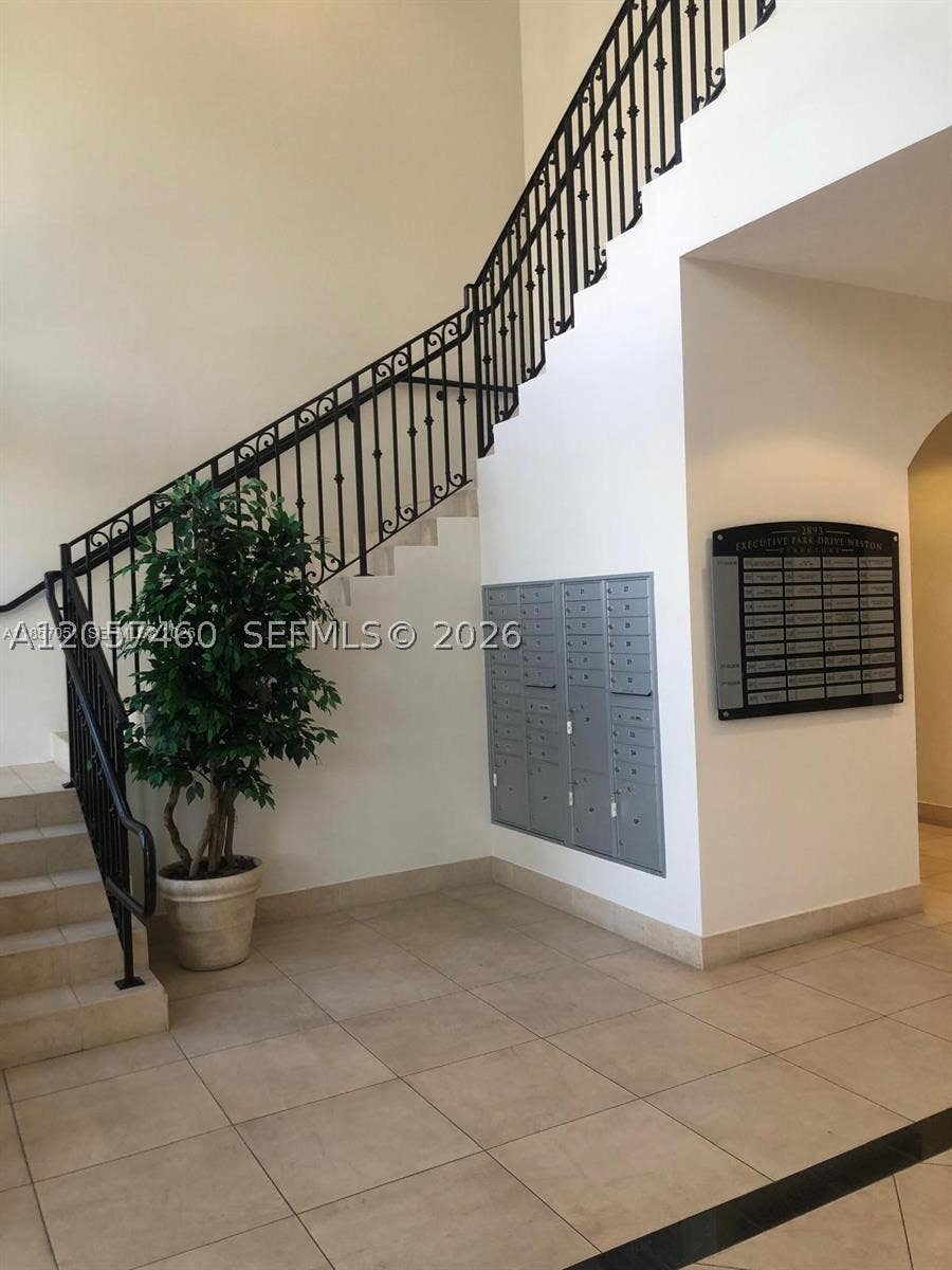 Photo of 2893 Executive Park Dr #302, Weston, FL 33331 (MLS # A12057460)