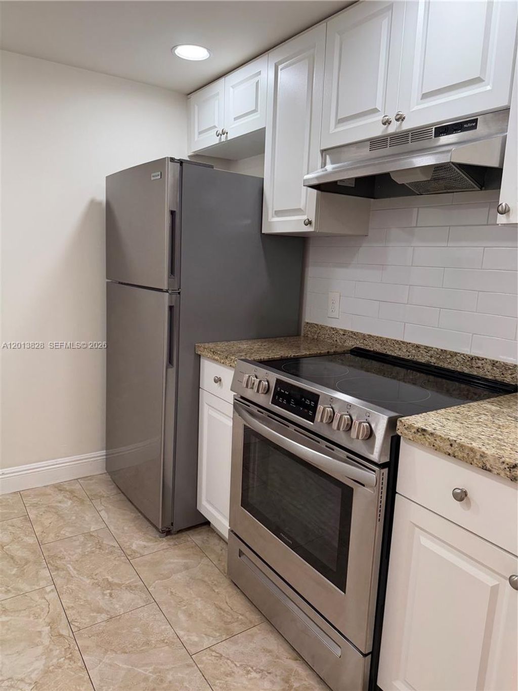 Photo of 1551 SW 135th Ter #311G, Pembroke Pines, FL 33027 (MLS # A12013828)