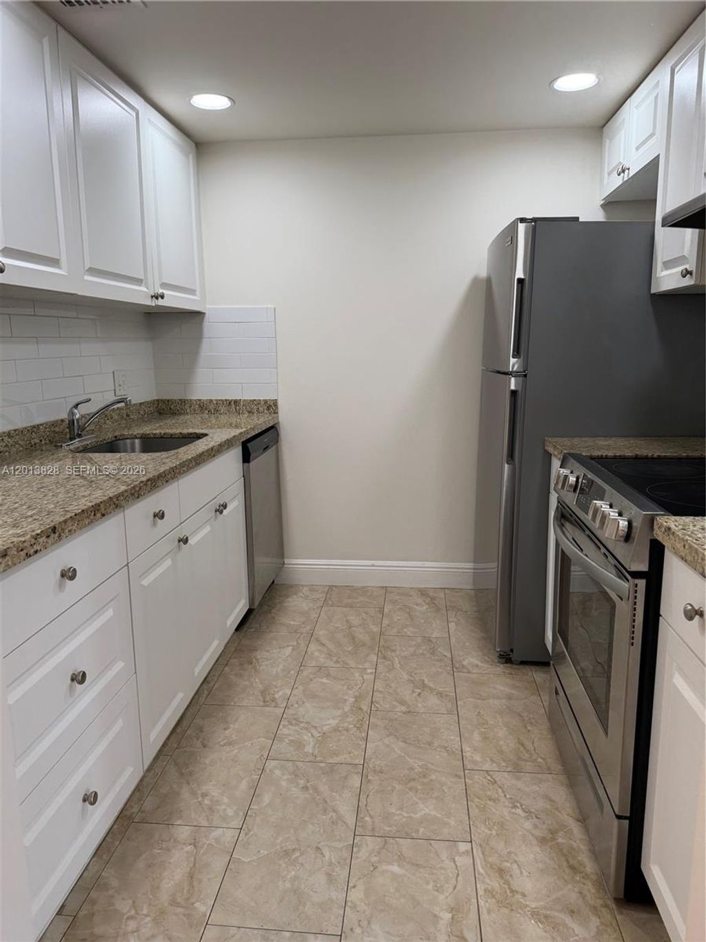 Photo of 1551 SW 135th Ter #311G, Pembroke Pines, FL 33027 (MLS # A12013828)