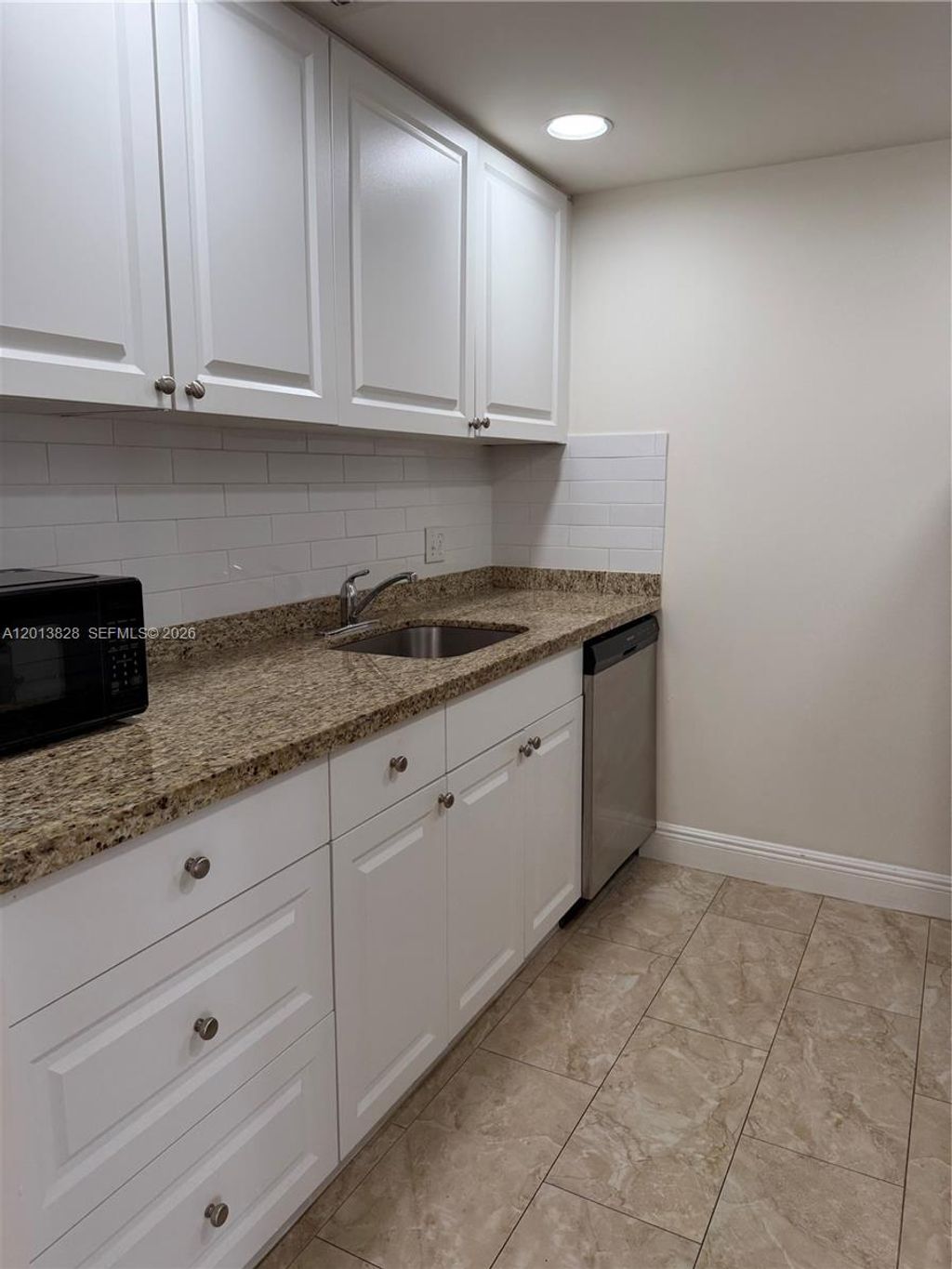 Photo of 1551 SW 135th Ter #311G, Pembroke Pines, FL 33027 (MLS # A12013828)