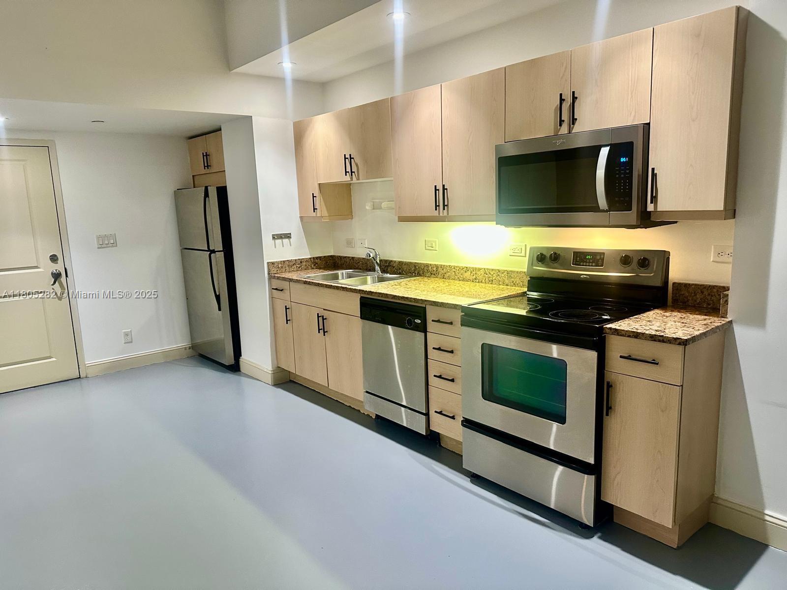 111 E Flagler 702