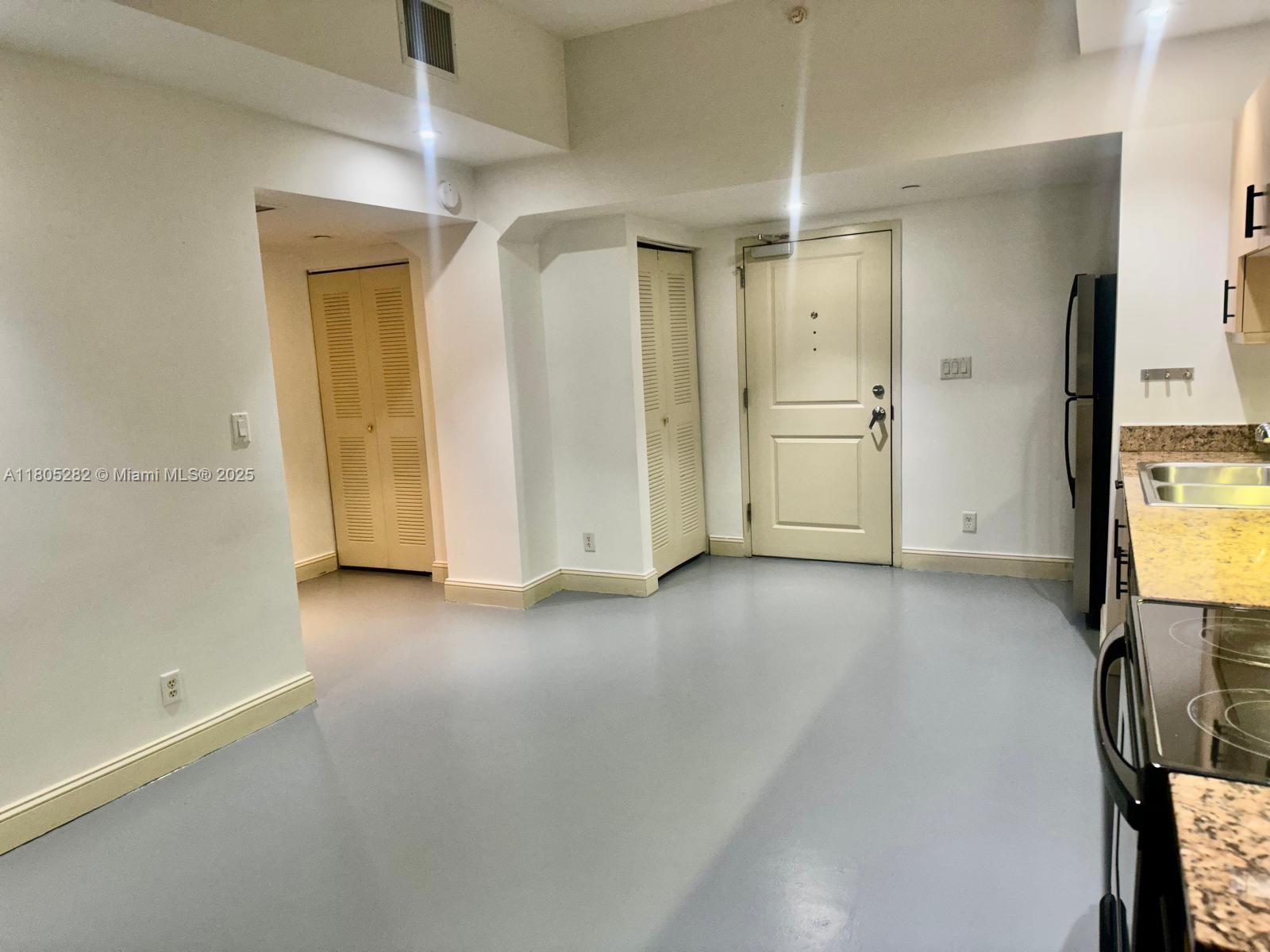 111 E Flagler 702
