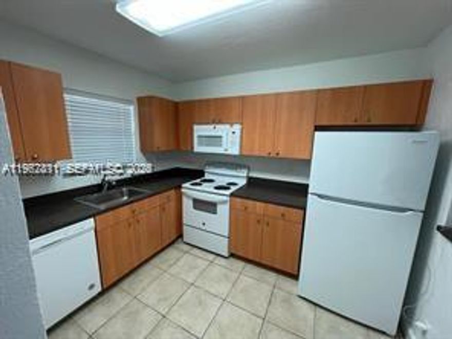 Nice and well-maintained converted 2 bedroom, 1 bathroom apartment centrally located in Plantation. This unit offers a comfortable and functional layout with spacious living and dining areas, ample natural light, and assigned parking. Conveniently located near major highways, shopping centers, restaurants, and schools, with easy access to Broward Blvd, University Dr, and I-595. Well-kept community. Great opportunity for owner-occupants or investors. Easy to show.