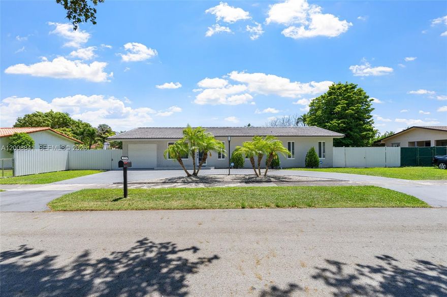 Beautifully remodeled home featuring a spacious and fully permitted 1/1 efficiency with private entrance and patio area. The efficiency includes a kitchenette, closet space, and offers excellent flexibility for extra income, guests, or extended family. It can also be easily integrated into the main home if desired.

The main residence is bright and welcoming, filled with natural light and upgraded throughout. All windows and doors are impact rated. The kitchen and bathrooms feature high-end finishes with brand new appliances, offering a modern and move-in ready feel.

The property sits on a large lot with an expansive backyard providing endless possibilities. Plenty of space for entertaining, and room on the side of the home to park a boat or RV. Additional features include a hot tub and storage shed.

Conveniently located in a central area close to major expressways including the Turnpike and Dolphin Expressway, as well as shopping, dining, and entertainment. Situated in a quiet residential neighborhood with low traffic and proximity to quality schools.