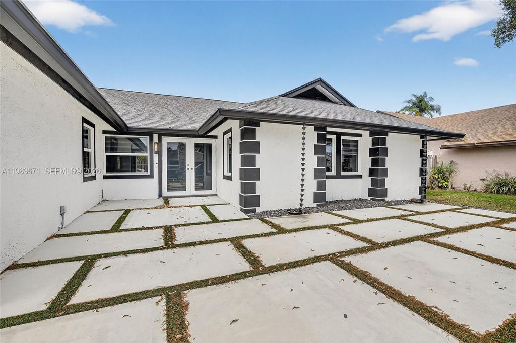 Photo of 8301 NW 52nd St, Lauderhill, FL 33351 (MLS # A11983671)