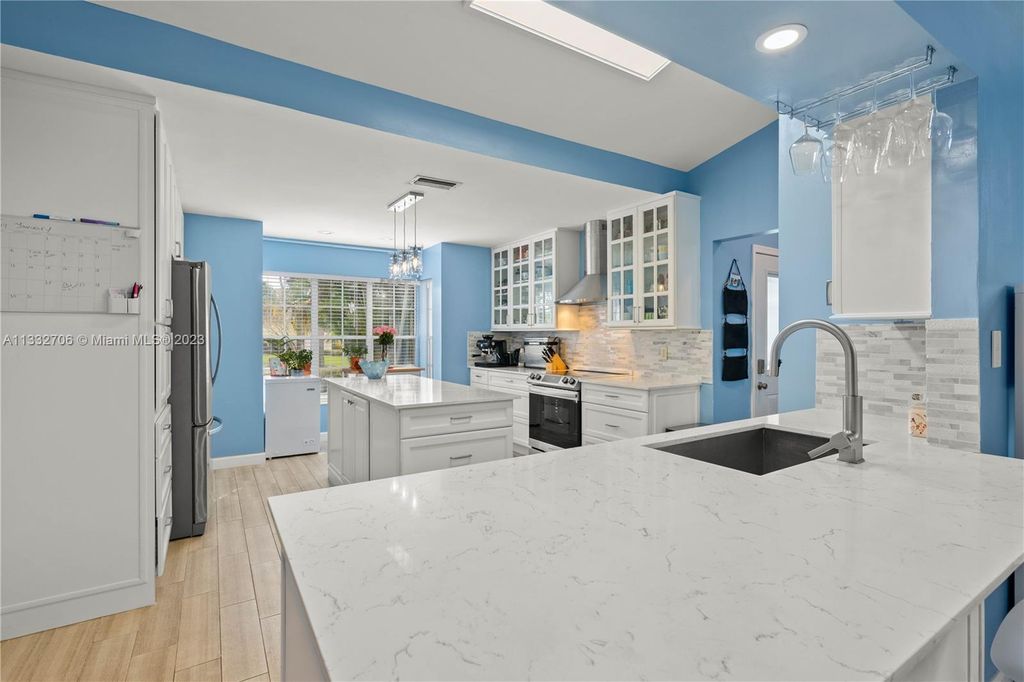 Photo of 103 Pacer Ln, Green Acres, FL 33413 (MLS # A11332706)