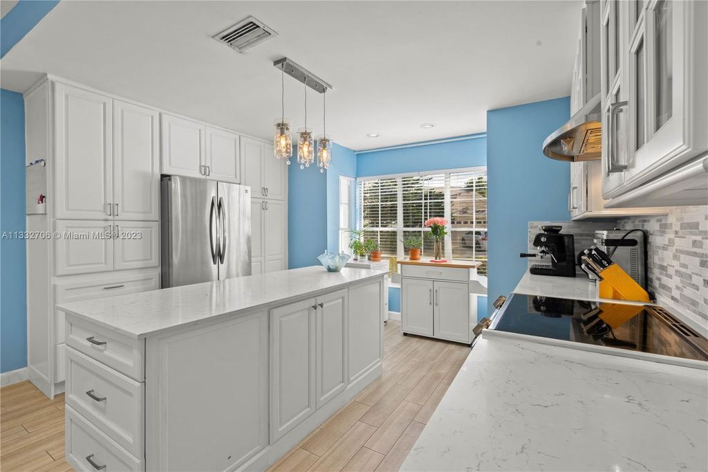 Photo of 103 Pacer Ln, Green Acres, FL 33413 (MLS # A11332706)