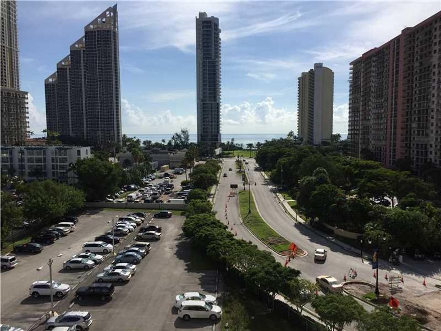 Large spacious corner 2 Bedroom, 2 Bathroom unit. Approx. 1,856 SF. Eat in kitchen and formal dining room.  Views of ocean from formal dining and living room. Wrap around terrace with panoramic views. Large master suite with his and her walk in closets. L ots of cabinets in kitchen. Tile floors in Kitchen,living room and dining room and carpeting in bedrooms. Building has been renovated and completed 40 year inspections. No renting permitted.