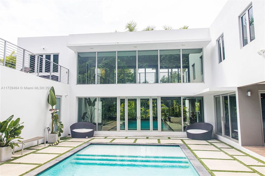 Experience Modern Paradise. This stunning residence boasts a spacious open floor plan, seamlessly blending indoor and outdoor living with abundant natural light. Enjoy 5 bedrooms, 3.5 baths, plus a bonus room, 2-car garage, ample gated parking, a private pool, and a sundeck overlooking the pool/garden. Nestled in a lush tropical setting, this home offers a tranquil escape while remaining close to South Miami's vibrant amenities. Excellent schools and family-friendly recreation complete this idyllic package. Schedule your private showing today.