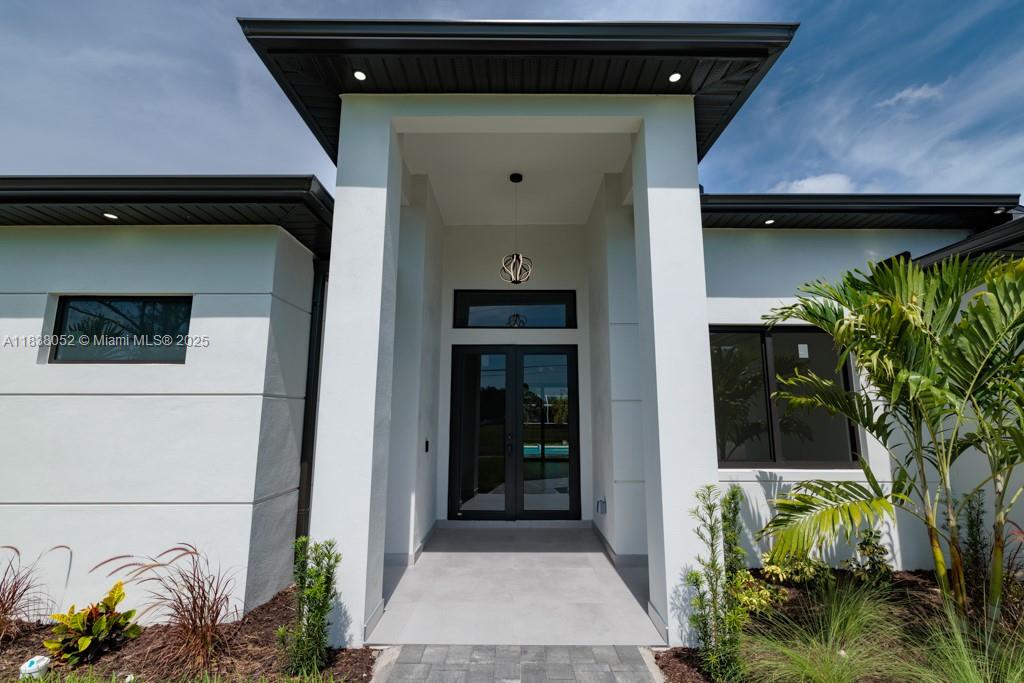 MOTIVATED SELLER!!!***WELOME TO YOUR NEW HOME*** Discover this newly built home offering 3 bedrooms + a versatile den , 3 full bathrooms, and a thoughtfully designed layout that blends style and functionallity.
Located in a great area , this property features an open-concept living area , a modern kitchen with quality finishess , and an indoor bar perfect for entretaining guests or enjoying quiet evenings at home. This great house includes walk-in closets , a generous master bedroom with its masterbathroom and 2 garage spaces for convenience.Step outside to enjoy the private pool , idel for relaxing or weekend fun in the sun. This excellent home combines comfort , modern designed , and the best of Florida living. Schedule your showing today and make this your new home in Cape Coral!