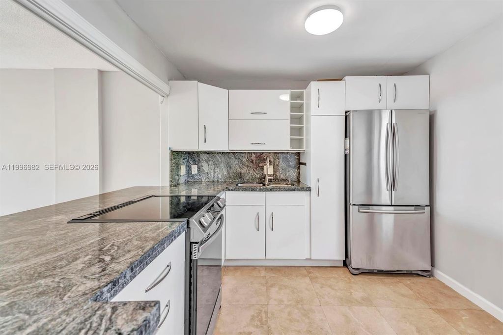 Photo of 3199 S Ocean Dr #406, Hallandale Beach, FL 33009 (MLS # A11996982)