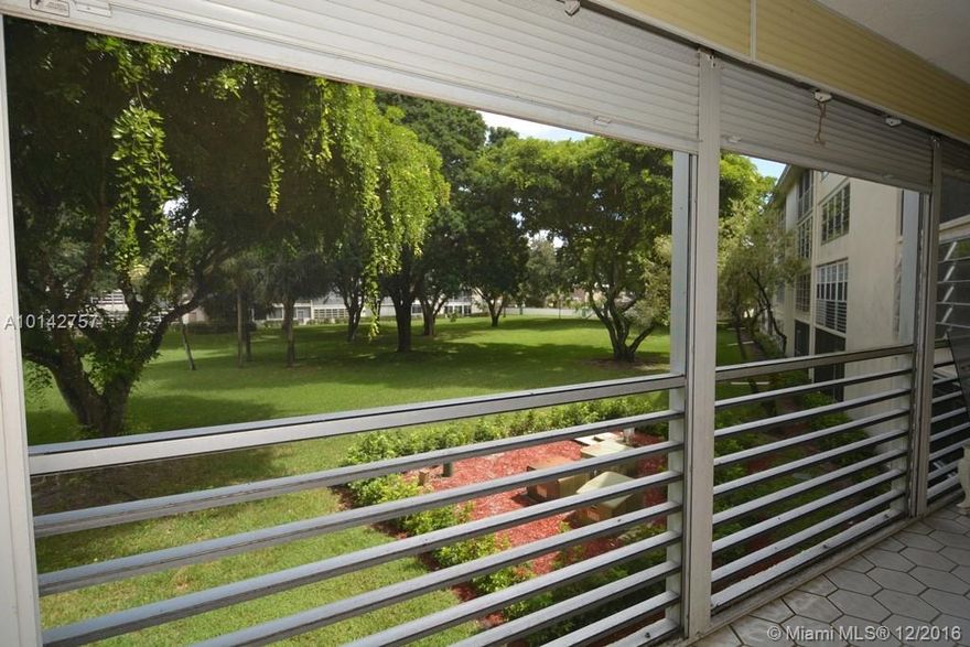 PRICE REDUCED!! Bring all offers!! Seller highly motivated!! Bright and airy updated 2/2 in the desirable 55+ community of Wynmoor. Tile and wood floors throughout. No carpet. Washer/Dryer inside unit. Large screened patio overlooking a serene garden view. Wynmoor is an active adult community featuring many amenities and activities including golf, tennis, and various group functions and events.  Centrally located near tons of shopping. One occupant must be 55+.