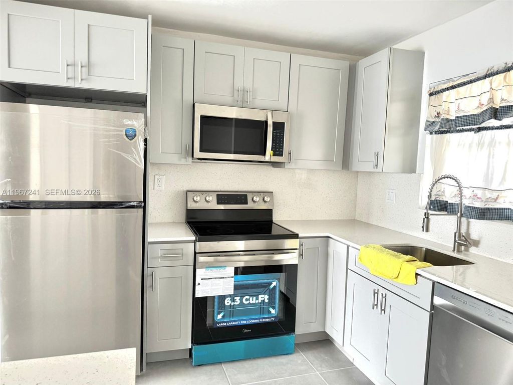 Photo of 7980 N French Dr #3-404, Pembroke Pines, FL 33024 (MLS # A11967241)