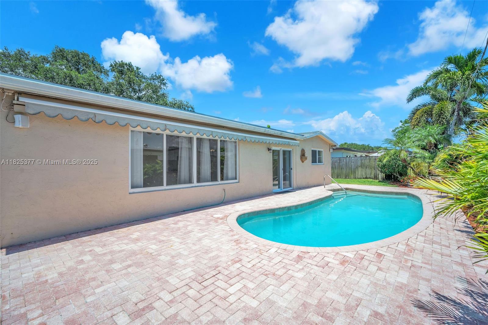 Superb upgraded Cooper City Cooper Estate pool home. Walk to stellar Cooper City schools and public golf course. Gourmet kitchen with 2023 wood cabinetry, granite counters, stainless steel appliances. Sliding glass doors open to private, fully fenced tropical paradise with paver patio and beautiful pool, sun awning, tropical landscaping and storage shed. Impact doors and windows, hurricane-rated garage door, newer 2017 roof. Other upgrades incl 2023 A/C and water heater, wood laminate flooring and tile, lighting and more. Deep one car garage plus circular driveway with room for 4 more cars. Perfect home and spectacular long-term investment. No HOA = no HOA fees. Awesome family home or high yield investment property.