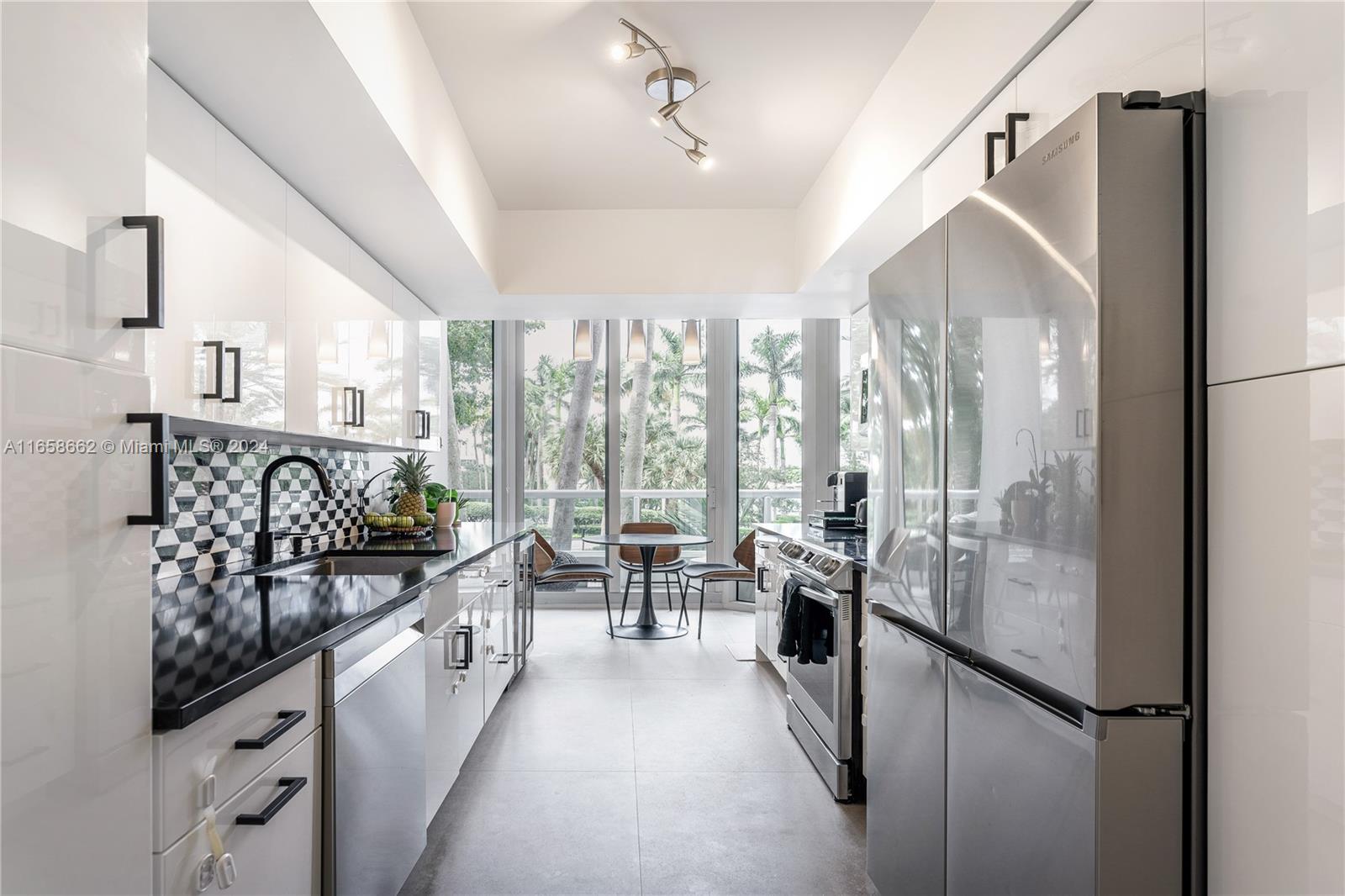 Luxurious Modern Living at The Point of Aventura! Priced to sell!
This stunning, renovated 2-bed, 2-bath loft-style condo offers 1,510 sq. ft. of elegance, featuring 12 ft ceilings, new 24x48 porcelain floors, and floor-to-ceiling glass doors leading to an oversized terrace with tropical marina views. The gourmet kitchen includes quartz countertops, a marble backsplash, new SS Samsung appliances, a beverage fridge, and two pantries. Split bedroom layout with custom closets, new A/C with Nest Thermostat, new water heater, laundry room with a new Samsung washer/dryer.
Enjoy luxury amenities: a spa, fitness center, 4 tennis courts, cafe, marina, jogging path, and kids' playground. Minutes from Aventura’s schools, dining, shops, and the beach. EV-ready and the best deal in Aventura!