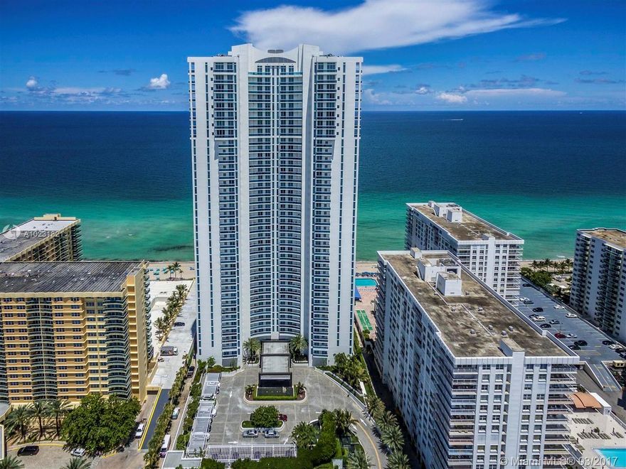 DRASTICALLY REDUCED!! NOTHING COMPARES TO THIS EXQUISITE HOME IN THE SKY. SPACIOUS 3 BEDROOM, 3.5 BATH PLUS DEN CONDO HAS BREATHTAKING EAST/WEST "DIRECT" OCEANFRONT & INTRACOASTAL VIEWS WITH LARGE BALCONIES. PRIVATE ELEVATOR. UPGRADED KITCHEN WITH FULL CENTER ISLAND, 2 WINE COOLERS & WET BAR. BEAUTIFULLY APPOINTED FINISHINGS INCLUDING STUNNING PORCELAIN FLOORS IN LIVING AREA & CUSTOM WOOD FLOORS IN BEDROOMS. ITALIAN CLOSETS & CUSTOM WOOD CABINETRY THROUGHOUT. SAVANT HOME/REMOTE AUTOMATION SYSTEM W/ SURROUND SOUND & CUSTOM AUTOMATIC SHADES. TRUE RESORT LIVING WITH POOL & BEACH SERVICE, CAFE, CONCIERGE, GYM, SPA, TENNIS, BREAKFAST ROOM, THEATER ++. ALSO INLCLUDES 2 PARKING SPACES, PRIVATE HUMIDOR, WINE STACK & EXTRA STORAGE UNITS. THIS IS AN UNBELIEVABLE VALUE!!