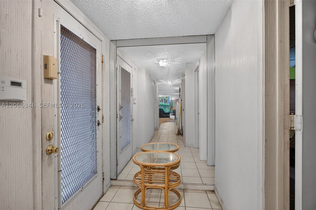 Photo of 3772 Inverrary Blvd #101, Lauderhill, FL 33319 (MLS # A12066346)
