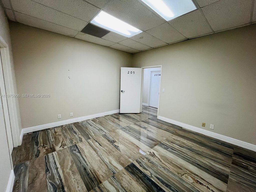 Photo of 6101 W Atlantic Blvd #205, Margate, FL 33063 (MLS # A11975906)