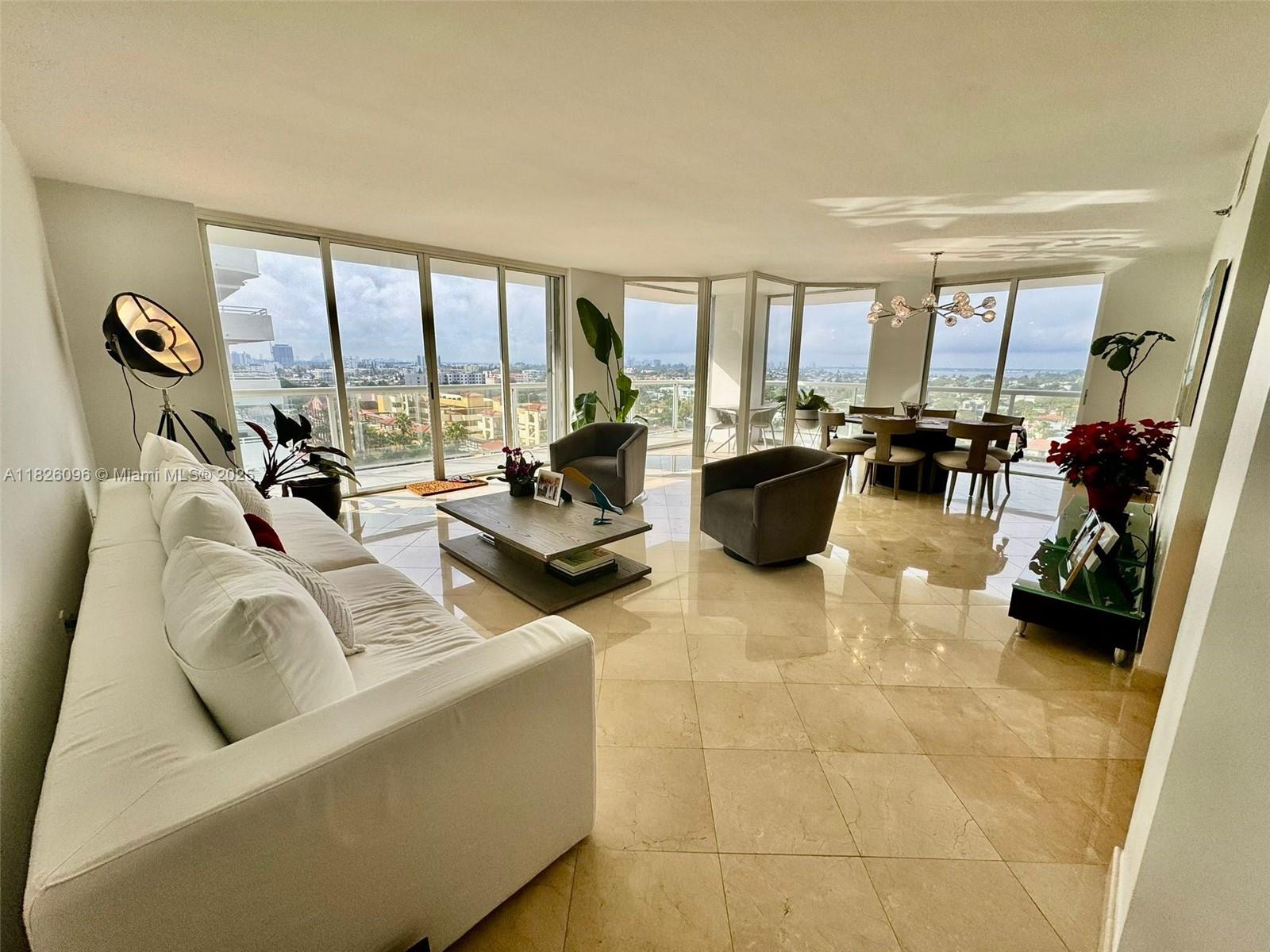 Magnificent unit in the prestigious Mirage Condo Building! Enjoy a wrap-around balcony with breathtaking views of the north and south Miami skyline, the bay and the ocean. Located on the ninth floor. Step into the spacious entrance foyer, leading to the living and dinning rooms. These rooms are surrounded by glass sliding doors, providing a seamless connection to the outdoors. This unit has ample closets to store your belongings. Amenities in the building include a brand new pool and hot tub, a private outdoor lounge area between the pool deck and the beach boardwalk, a fitness center, dedicated valet and lobby attendants. This unit comes with one assigned covered parking space, as well as an additional valet parking option for you or your guests.