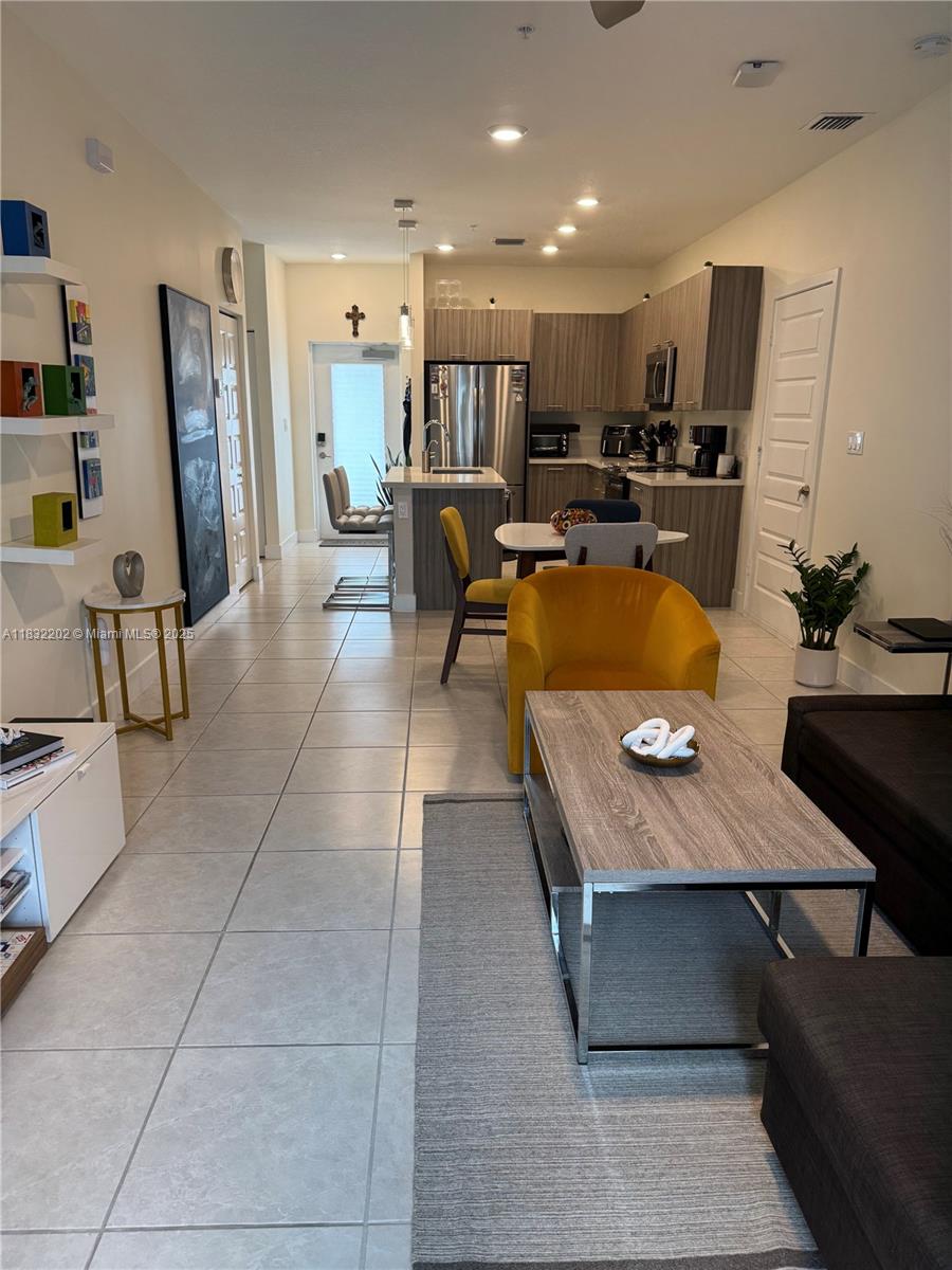 Resort-Style 2/2 Condo Near City Place & Downtown Doral
Beautifully maintained, this spacious 2-bedroom, 2-bath condo offers a split floor plan with two private entrances and a kitchenette in a studio ideal for large families or investors looking for rental flexibility. Features include ceramic tile floors, a modern kitchen with quartz island, stainless steel appliances, and impact windows and doors. Enjoy luxury amenities: clubhouse, resort-style pool with cabanas, gym, splash park, business center, indoor basketball court & track. Located in a gated, family-friendly community close to top-rated schools, dining, shopping, and free daily Freebee transportation