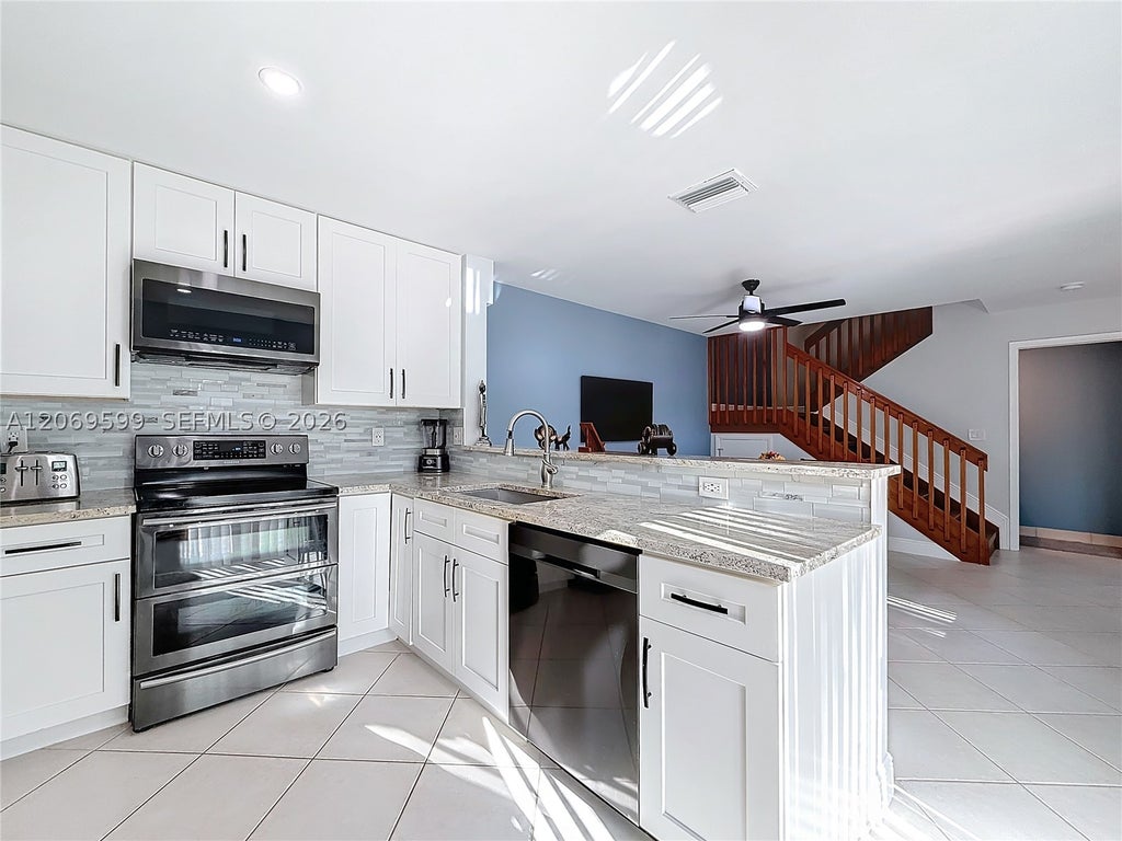 Photo of 10977 Long Boat Dr #10977, Cooper City, FL 33026 (MLS # A12069599)