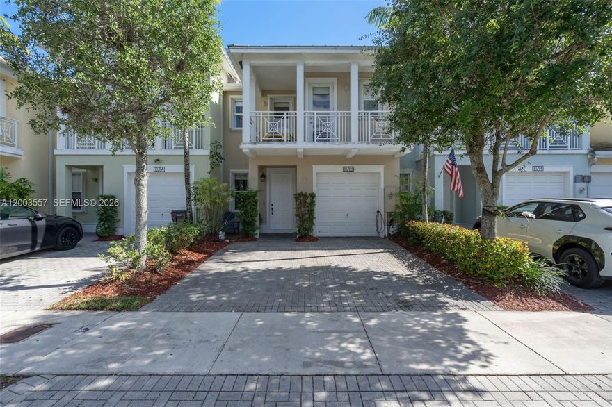 Beautiful lake front townhouse with an attached garage, located in a family-oriented community that sponsors many well coordinated and decorated events throughout the year. The association has a strong financial position, current year’s plans are fully funded and there are no current special assessments. The Reserve East has a very impressive community security which includes automated entrance, 24 hour patrols and AI powered cameras. 

The home is equipped with accordion shutters throughout, a smart security system, a keyless entry, and an 240-volt EV charger in the front of the house. 

The kitchen shows high quality refrigerator, dishwasher, microwave, and an induction range with convection and air fryer modes. All bedrooms have custom built-in closets and custom black out roller blinds. The laundry utility room is conveniently on the second floor near the bedrooms with upgraded washer and dryer.

The back patio faces the fountain in the lake, has travertine pavers throughout, and a hot tub purchased in 2021. Note, items also included are the hot tub, freezer in the garage, patio awning and patio refrigerator. Sectioned off extra bedroom can be converted back to garage again if the buyer prefers.