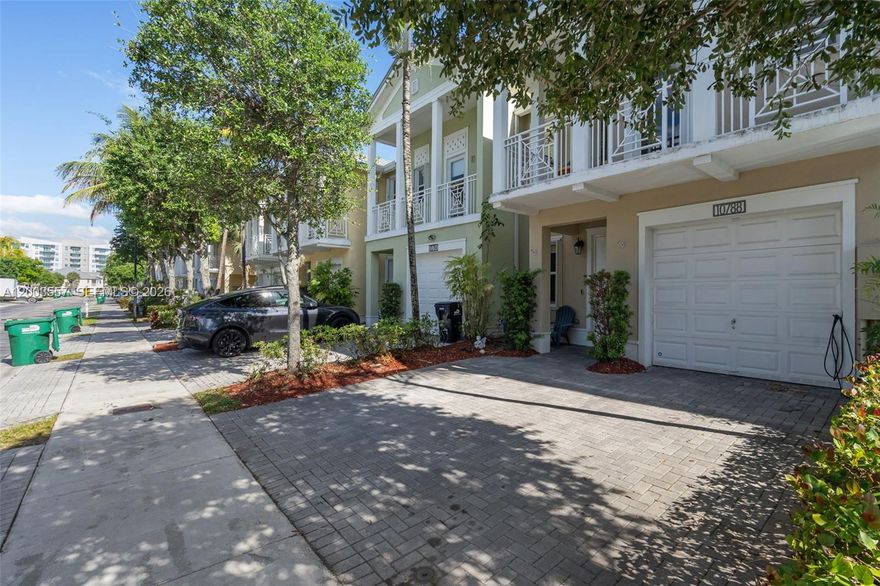 Beautiful lake front townhouse with an attached garage, located in a family-oriented community that sponsors many well coordinated and decorated events throughout the year. The association has a strong financial position, current year’s plans are fully funded and there are no current special assessments. The Reserve East has a very impressive community security which includes automated entrance, 24 hour patrols and AI powered cameras. 

The home is equipped with accordion shutters throughout, a smart security system, a keyless entry, and an 240-volt EV charger in the front of the house. 

The kitchen shows high quality refrigerator, dishwasher, microwave, and an induction range with convection and air fryer modes. All bedrooms have custom built-in closets and custom black out roller blinds. The laundry utility room is conveniently on the second floor near the bedrooms with upgraded washer and dryer.

The back patio faces the fountain in the lake, has travertine pavers throughout, and a hot tub purchased in 2021. Note, items also included are the hot tub, freezer in the garage, patio awning and patio refrigerator. Sectioned off extra bedroom can be converted back to garage again if the buyer prefers.