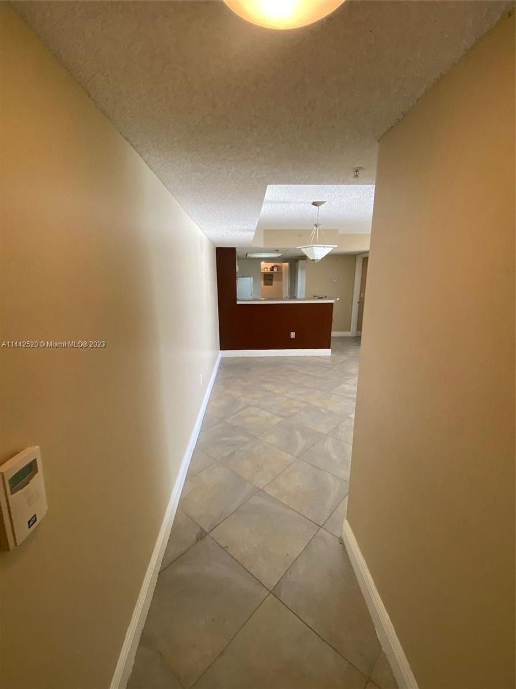 Photo of 5055 Wiles Rd #206, Coconut Creek, FL 33073 (MLS # A11442520)