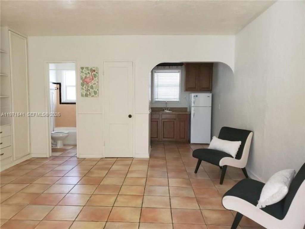 Photo of 309 Crocus Ter #10, Hollywood, FL 33019 (MLS # A11971841)