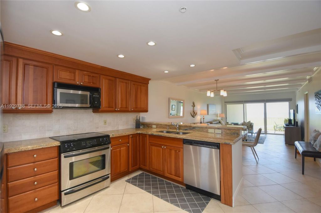 Photo of 3101 S Ocean Blvd #118, Highland Beach, FL 33487 (MLS # A11929788)