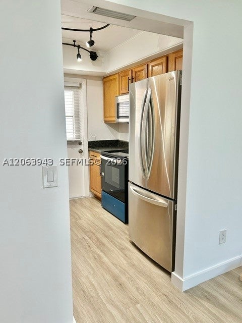 Photo of 2431 SW 82nd Ave #204, Davie, FL 33324 (MLS # A12063943)
