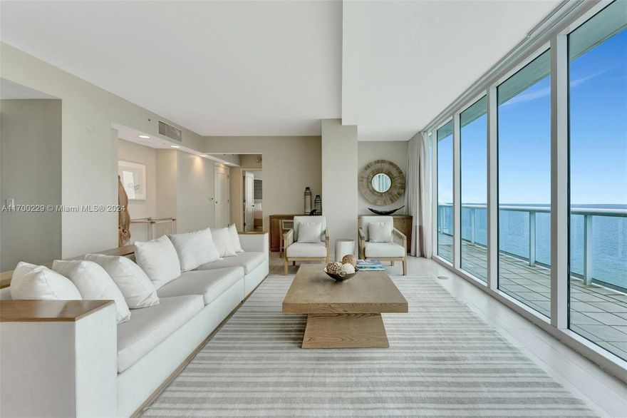 Step into this elegant two-bedroom, two-and-a-half-bathroom penthouse, where an open-concept living and dining space welcomes you with sophisticated design, plush furnishings, and floor-to-ceiling windows that frame mesmerizing ocean views.  

The primary suite offers a serene retreat with a king-sized bed, flat-screen TV, and a spa-inspired en-suite bathroom, perfect for unwinding. A private  wrap around balcony provides a tranquil space to savor the unobstructed ocean views while the resort’s world-class amenities, including a fitness center, heated pool, and exceptional dining options, enhance your living experience.  

Don’t miss this rare opportunity to own a luxurious sanctuary in one of South Florida’s most desirable beachfront destinations.