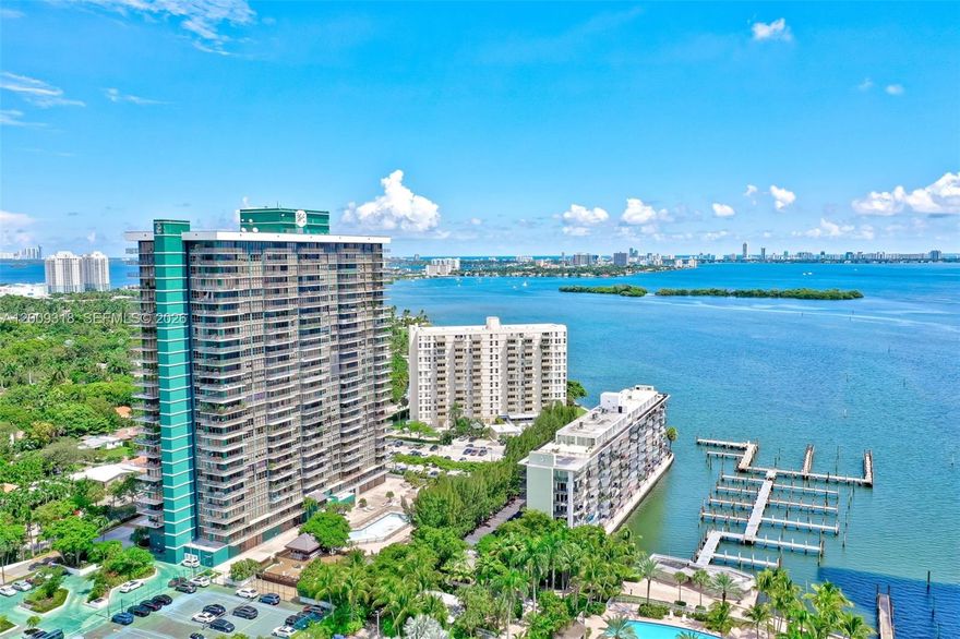 SELLERS WILL PAY SPECIAL ASSESSMENT IN FULL AT CLOSING!

Experience sensational views of the Miami skyline with glimpses of the ocean in the distance, surrounded by lush greenery. This 2 Bedroom/2 Bathroom residence features an open floor plan and is home to an award-winning designer, located in the prestigious Palm Bay Yacht Club.

The unit showcases a custom Salvarani chef’s kitchen with elegant mink marble and stone countertops, complemented by updated lighting and modern appliances. Beautiful porcelain flooring flows seamlessly throughout. The private balcony offers a serene “ocean of trees” view, with abundant natural light by day and a gentle bay breeze in the evenings, creating a peaceful, tranquil retreat.

Palm Bay Yacht Club offers resort-style amenities including 4 tennis courts, spa, fitness center, library, Gated community with a 24-hour doorman and valet, pool, jacuzzi, and on-site bar & grill, perfect for entertaining. Ideally located just minutes from the Design District, Wynwood, and close to Miami Beach, & Downtown area.

Resort living at its finest.