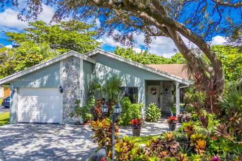 Photo of 990 NW 89th Ave, Plantation, FL 33324 (MLS # A11882549)