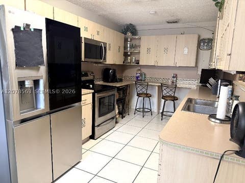 Tiny photo for 1340 W 36th St, Hialeah, FL 33012 (MLS # A12078563)