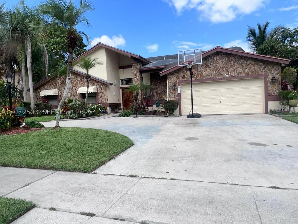 Photo of 4485 NW 64th Ter #4485, Lauderhill, FL 33319 (MLS # A12072503)