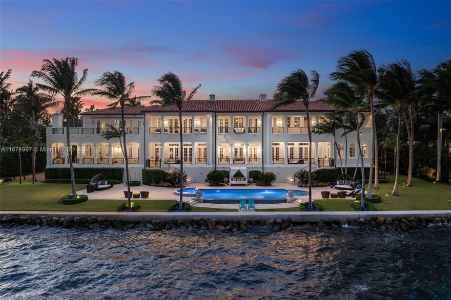 Discover unparalleled luxury in this magnificent residence, nestled in the  ultra-exclusive gated community of Gables Estates. Boasting 225 FT of pristine water footage offering breathtaking open bay views. Expansive living spaces filled with natural light. The gourmet chef's kitchen features custom cabinetry & top of the line appliances. Custom-built Wine Cellar holding  2,700+ bottles in a temperature-controlled environment. Full house automatic generator, elevator, impact windows /doors , A/C 4 car garage &  dock with boat lift. His/Hers offices, game/entertainment room as well as a fully equipped home gym. Spacious outdoor terraces, summer kitchen & bayfront pool. Situated in one of the most sought-after communities, this estate provides the utmost in privacy, security & luxury living.