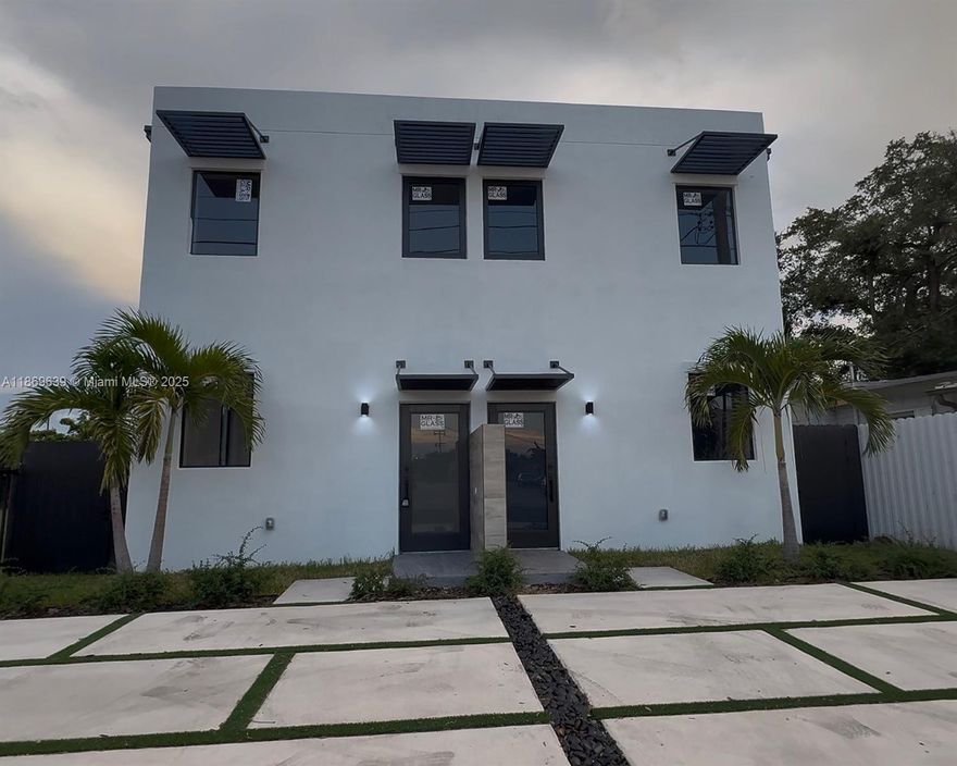 Welcome to this brand-new modern townhome in the heart of Miami—just 6 minutes from Miami International Airport and the new Freedom Park Complex, and 10 minutes from Downtown and Wynwood. This sleek 2-story residence features 2 bedrooms, 2.5 bathrooms, an open layout with high ceilings, a gourmet quartz kitchen, and large sliding doors to the private backyard. Luxury details include floor-to-ceiling tile baths with glass showers and floating vanities, porcelain flooring, impact-resistant windows and doors, and LED recessed lighting. With its own landscaped entrance and driveway, this home offers style and comfort. Perfect for families, investors, or short/long-term rentals, it also provides unbeatable convenience with quick access to the 112, I-95, and 836 expressways.