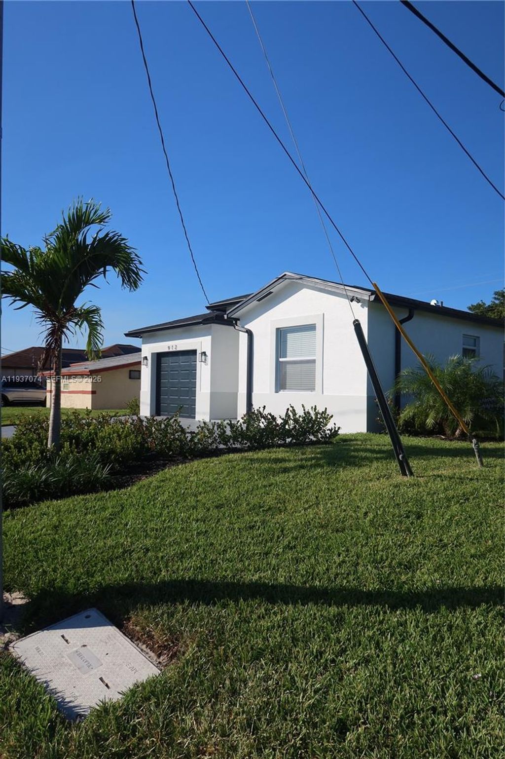 Photo of 912 W 10th St, Riviera Beach, FL 33404 (MLS # A11937074)