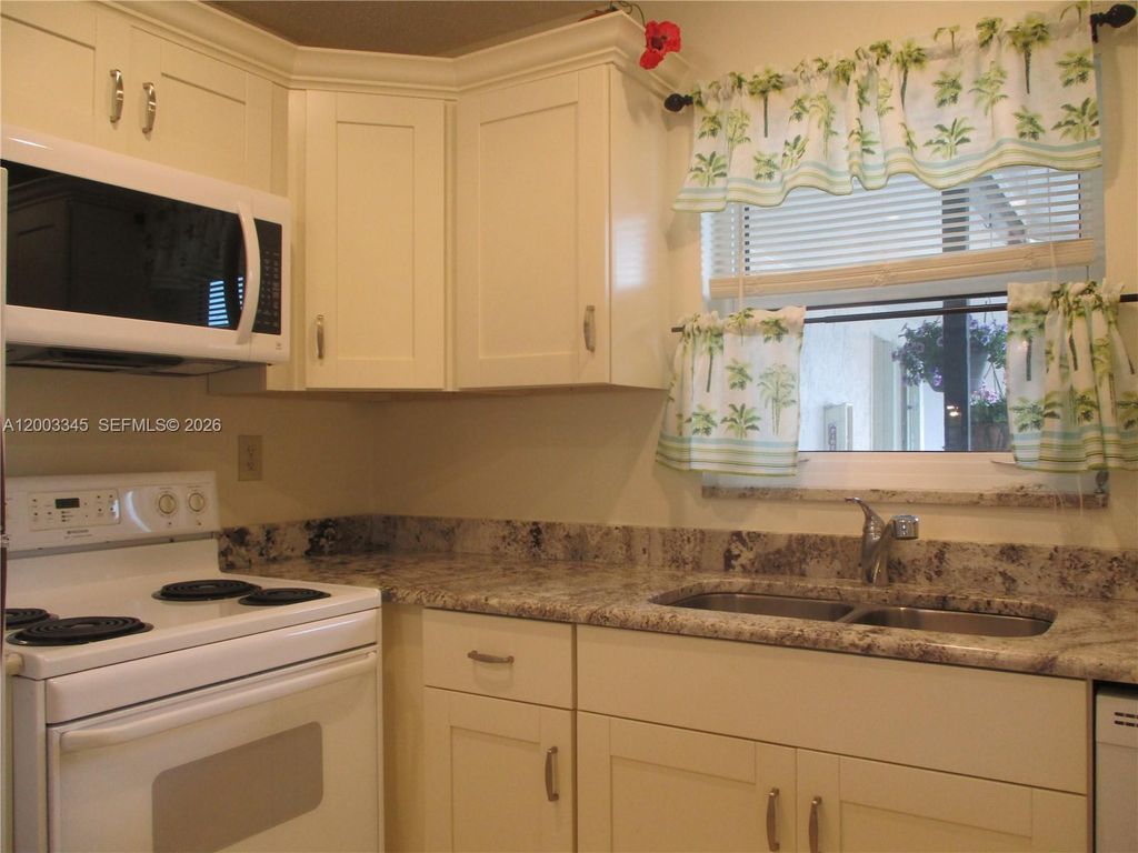 Photo of 6531 SE Federal Hwy #S212, Stuart, FL 34997 (MLS # A12003345)